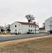 Continuing making history: Contractors move last two World War II-era barracks to new locations