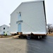 Continuing making history: Contractors move last two World War II-era barracks to new locations