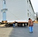 Continuing making history: Contractors move last two World War II-era barracks to new locations