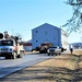 Continuing making history: Contractors move last two World War II-era barracks to new locations