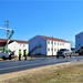 Continuing making history: Contractors move last two World War II-era barracks to new locations