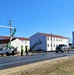 Continuing making history: Contractors move last two World War II-era barracks to new locations