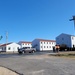 Continuing making history: Contractors move last two World War II-era barracks to new locations