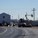 Continuing making history: Contractors move last two World War II-era barracks to new locations