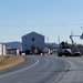 Continuing making history: Contractors move last two World War II-era barracks to new locations