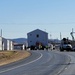 Continuing making history: Contractors move last two World War II-era barracks to new locations