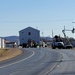 Continuing making history: Contractors move last two World War II-era barracks to new locations