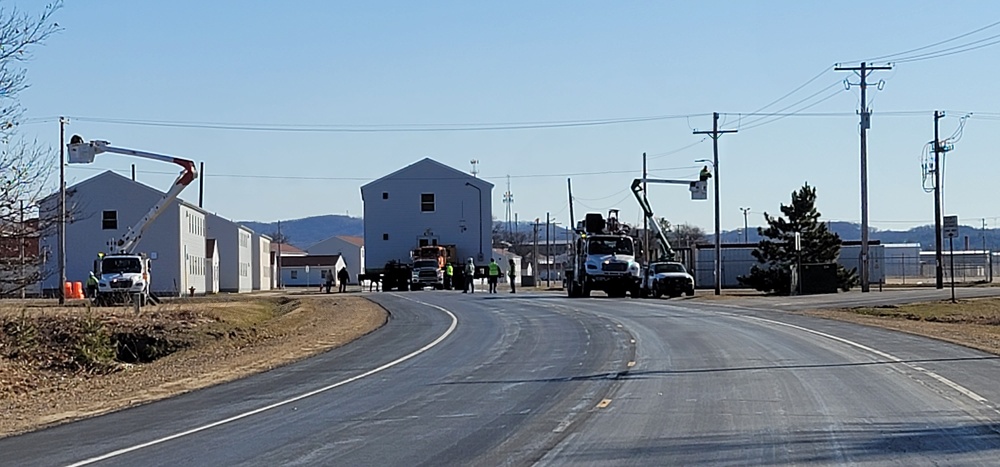 Continuing making history: Contractors move last two World War II-era barracks to new locations