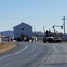 Continuing making history: Contractors move last two World War II-era barracks to new locations