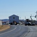 Continuing making history: Contractors move last two World War II-era barracks to new locations