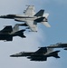 Four F/A-18E Super Hornets Fly In Formation Past USS Nimitz