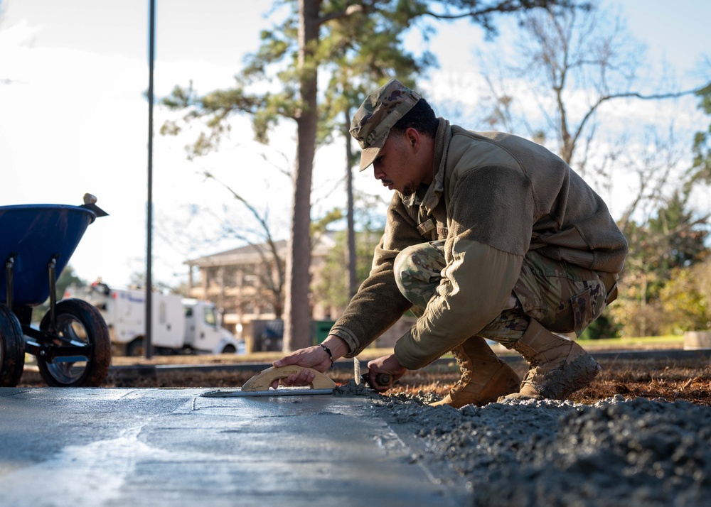 20th CES constructs fire pit for dorm community