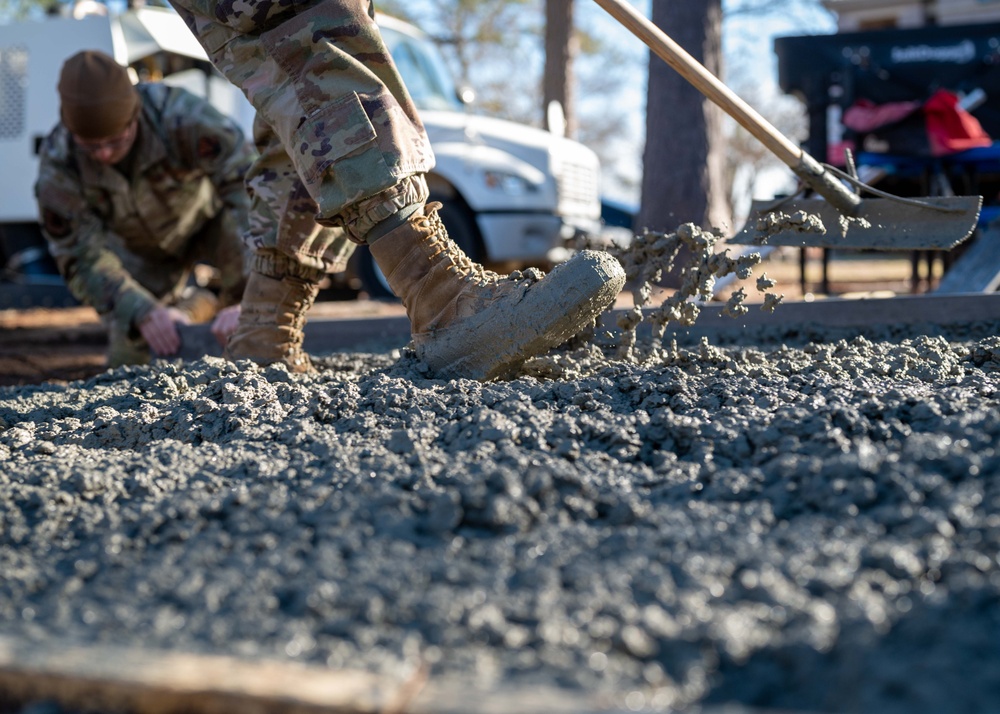 20th CES constructs fire pit for dorm community