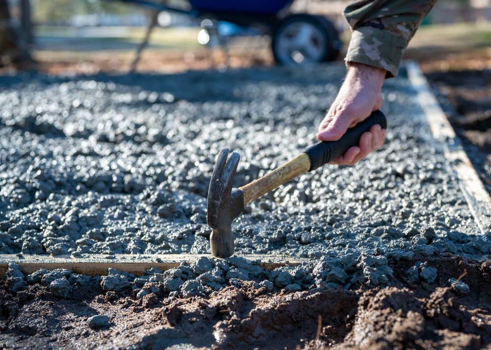 20th CES constructs fire pit for dorm community