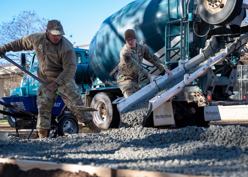 20th CES constructs fire pit for dorm community