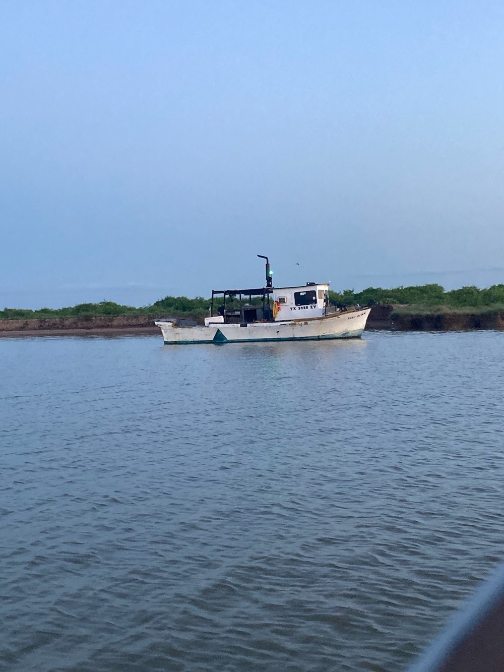 Coast Guard, good Samaritan rescue 3 from aground oyster boat near Sargent, Texas