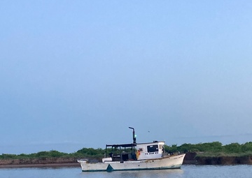 Coast Guard, good Samaritan rescue 3 from aground oyster boat near Sargent, Texas