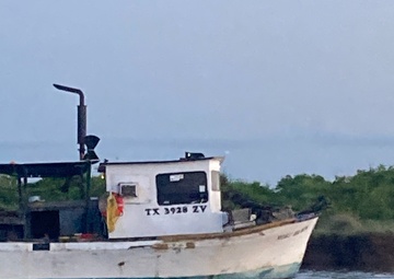 Coast Guard, good Samaritan rescue 3 from aground oyster boat near Sargent, Texas