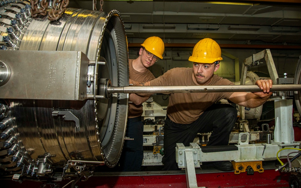 Sailors Check Engine Fan Alignment