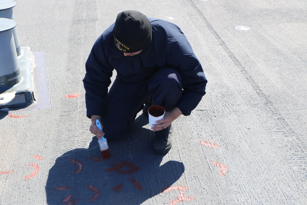 USS Princeton (CG 59) Sailors Conduct Repairs