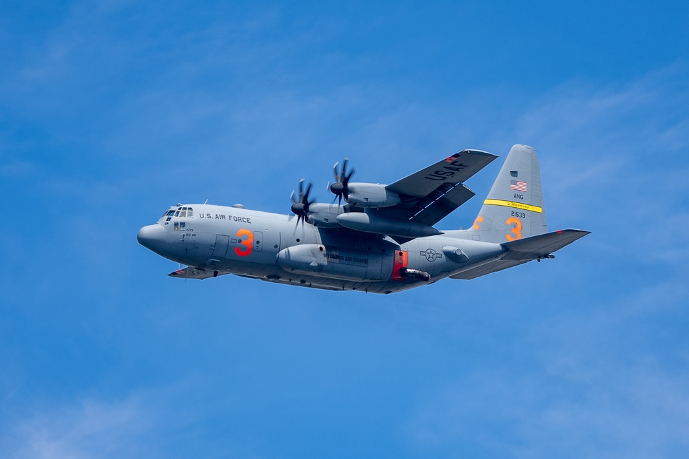 A C-130 from Wyoming Air National Guard's 153rd Airlift Wing performs a water drop during Modular Airborne Fire Fighting System (MAFFS) Spring Training 2023