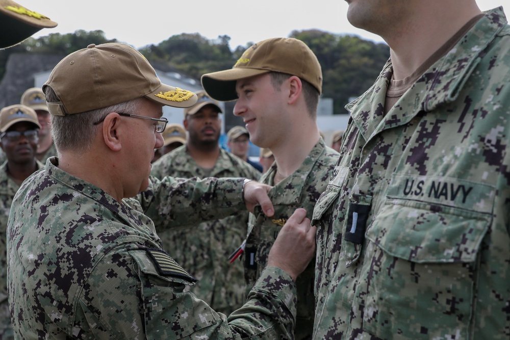 USS Hampton Sailors Receive Submarine Warfare Officer Pins from Commander, Task Force 74