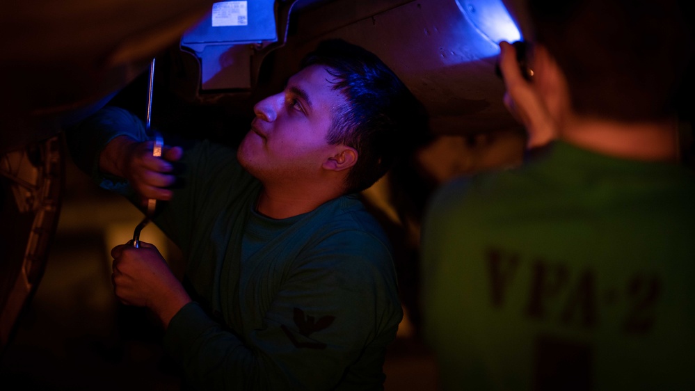 Sailor preforms maintenance aboard USS Carl Vinson