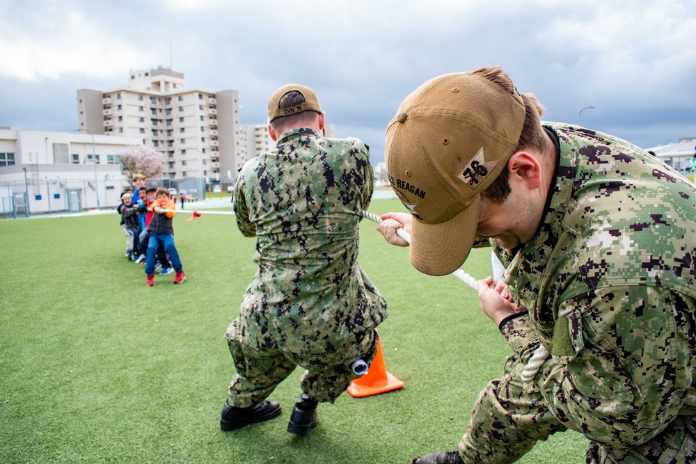 USS Ronald Reagan (CVN 76) Sailors participate in a community relations event