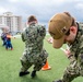 USS Ronald Reagan (CVN 76) Sailors participate in a community relations event