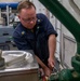Sailor preforms maintenance aboard USS Carl Vinson