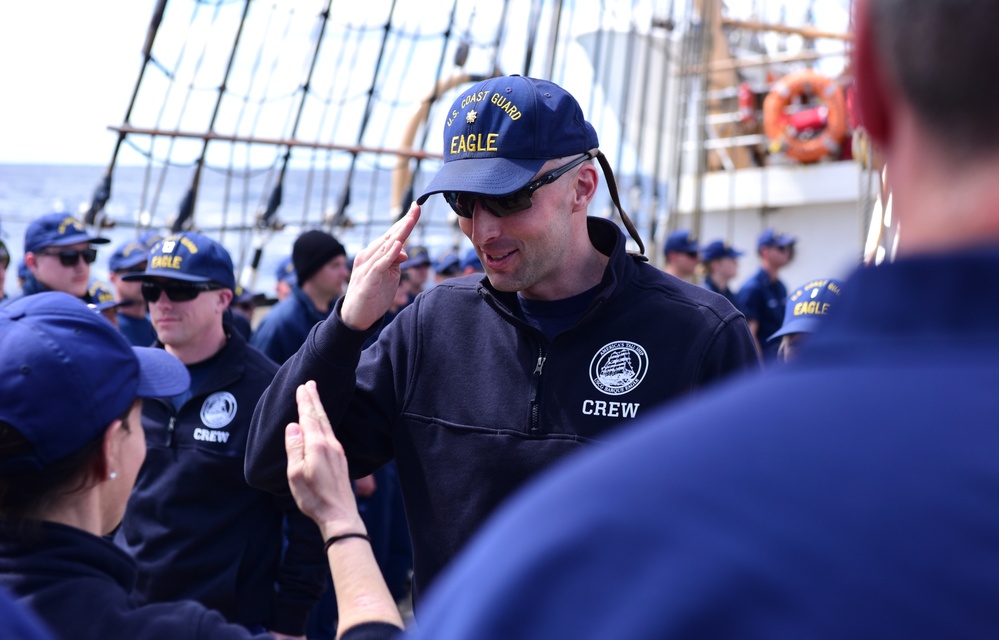 USCGC Eagle personnel conduct quarters while transiting the Atlantic Ocean