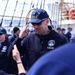 USCGC Eagle personnel conduct quarters while transiting the Atlantic Ocean