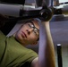 Airman works on components to KC-135 front landing gear