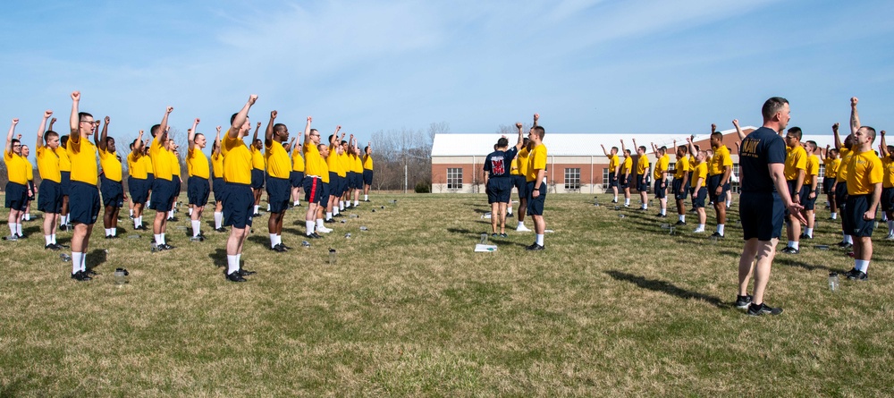 Recruits physically train at US Navy Recruit Training Command