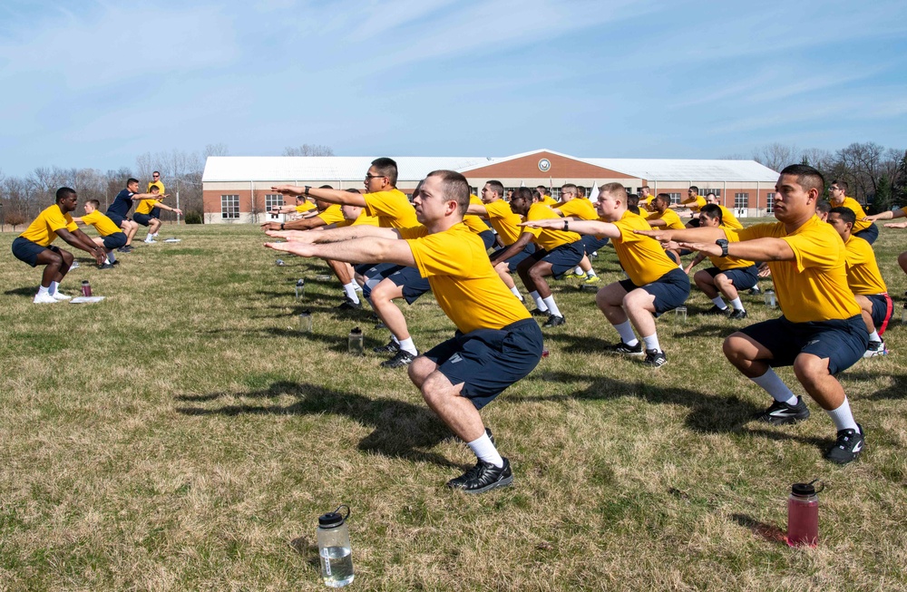 Recruits physically train at US Navy Recruit Training Command