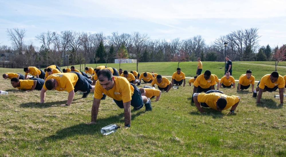 Recruits physically train at US Navy Recruit Training Command