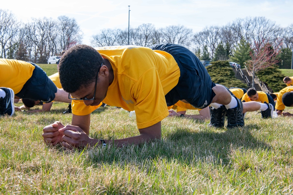 Recruits physically train at US Navy Recruit Training Command