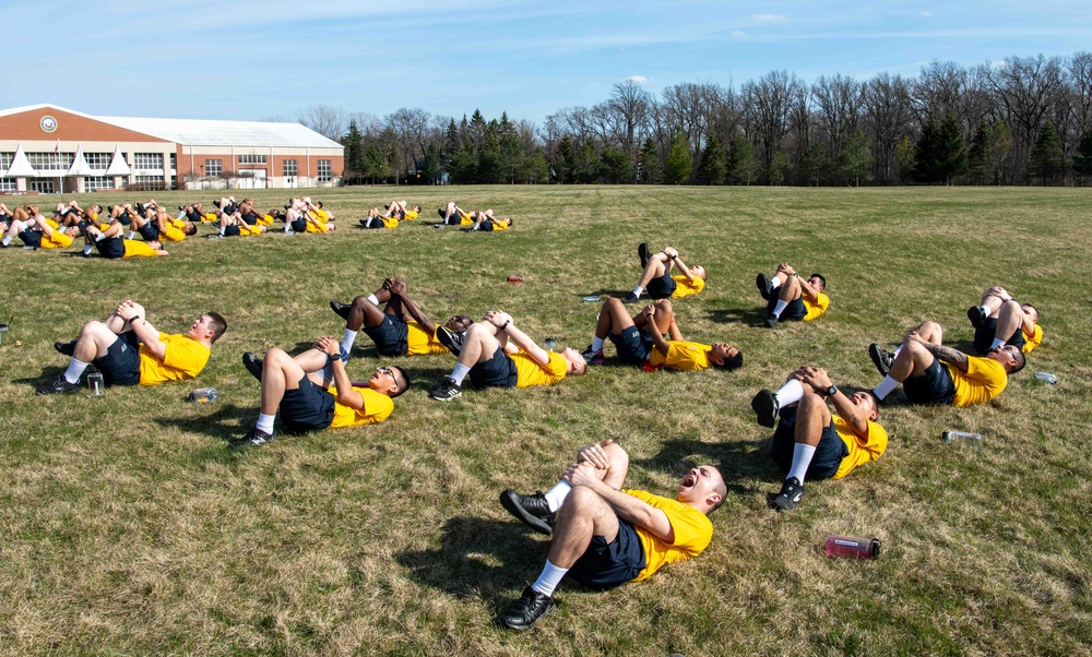 Recruits physically train at US Navy Recruit Training Command