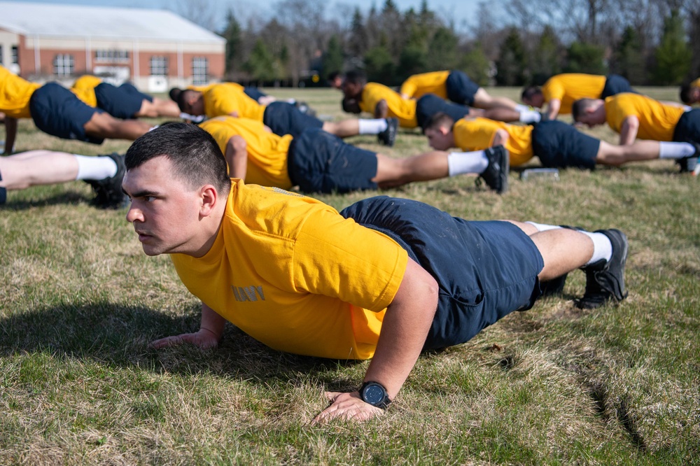 Recruits physically train at US Navy Recruit Training Command