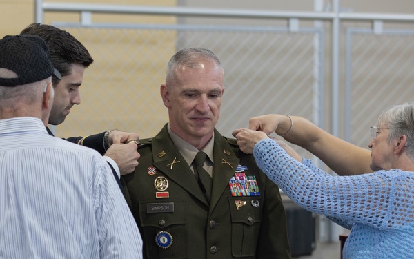 AXE founder, promoted to full-bird colonel