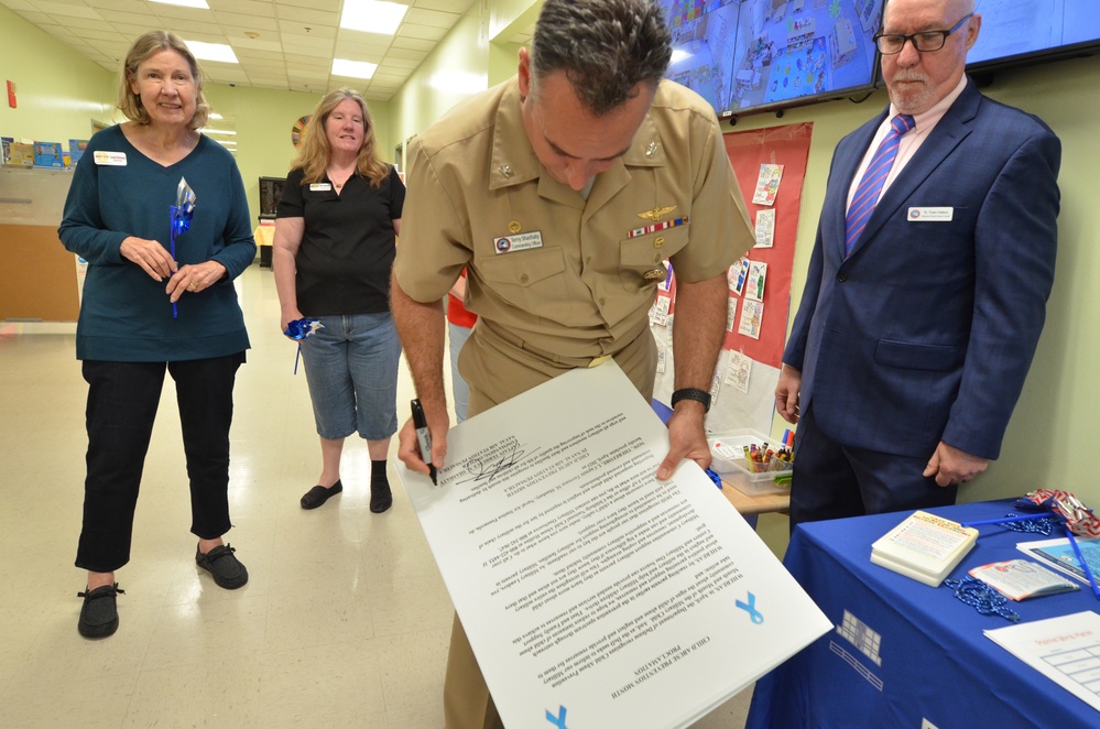 NAS Pensacola Commanding Officer Signs National Child Abuse Prevention Month Proclamation