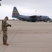 Public Affairs Specialist checks photos on the flightline at Channel Air National Guard Station, Calif.