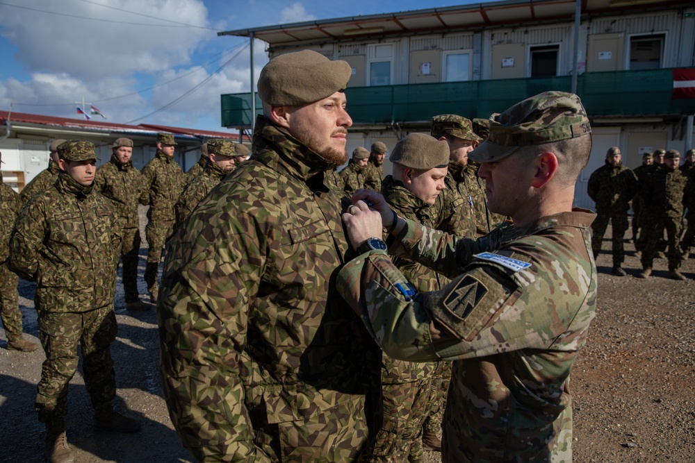 Kosovo Force-Regional Command-East, Latvian Contingent, celebrates their end of the KFOR mission