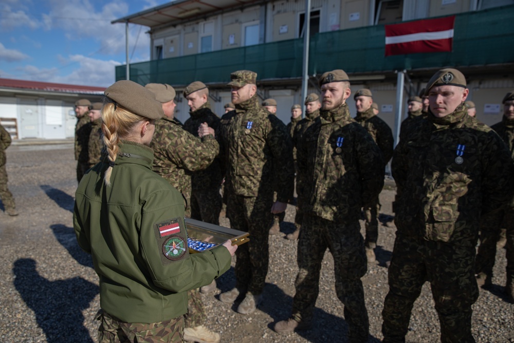 Kosovo Force-Regional Command-East, Latvian Contingent, celebrates their end of the KFOR mission