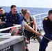 CGC Eagle personnel conduct sail preparations while underway in the Atlantic Ocean