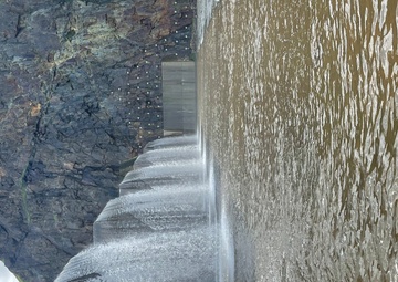 Water Flows Over Fuse Gates of Terminus Dam