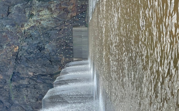 Water Flows Over Fuse Gates of Terminus Dam