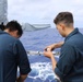 USS Princeton (CG 59) Sailors Conduct Maintenance