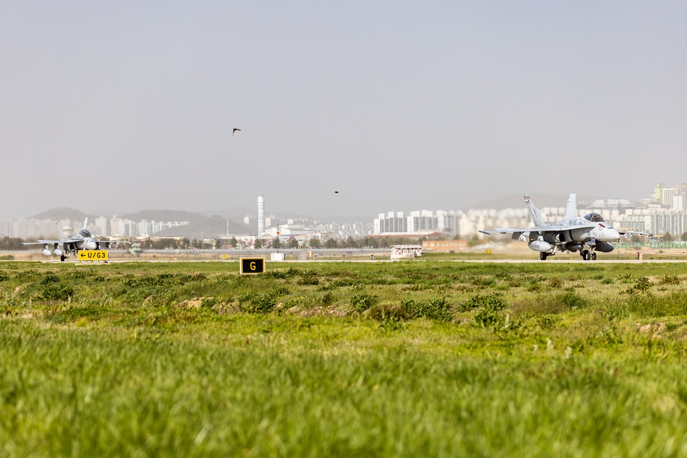 Marine Fighter Attack Squadron 242 and Marine Fighter Attack Squadron 115 arrive at Gwangju Air Base for Korea Flying Training 23