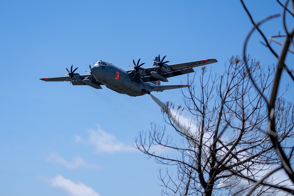 A C-130 from Nevada Air National Guard's 152nd Airlift Wing performs a water drop April 14, 2023, during Modular Airborne Fire Fighting System (MAFFS) Spring Training 2023